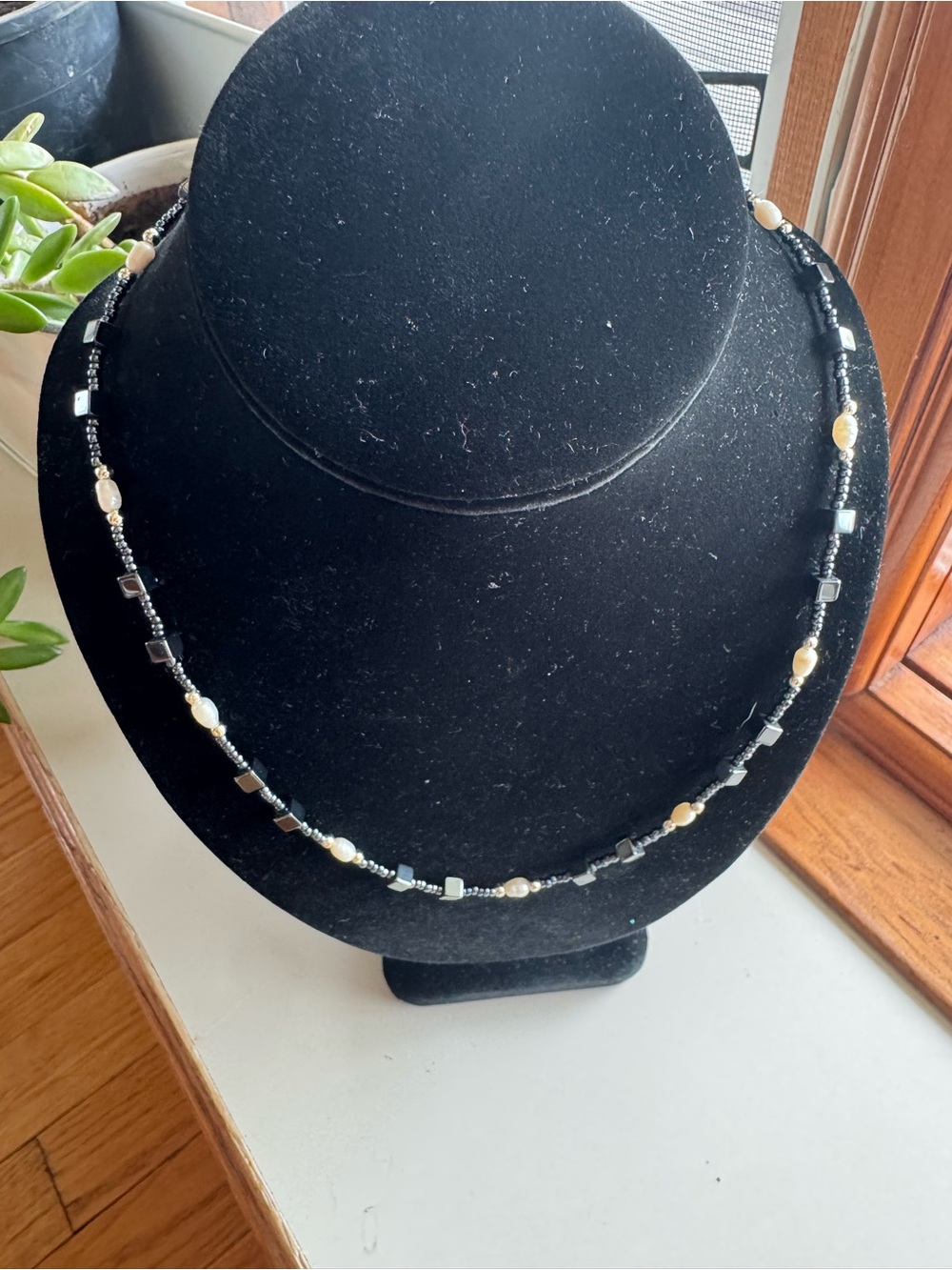 single-strand minimalist beaded station necklace featuring geometric accents